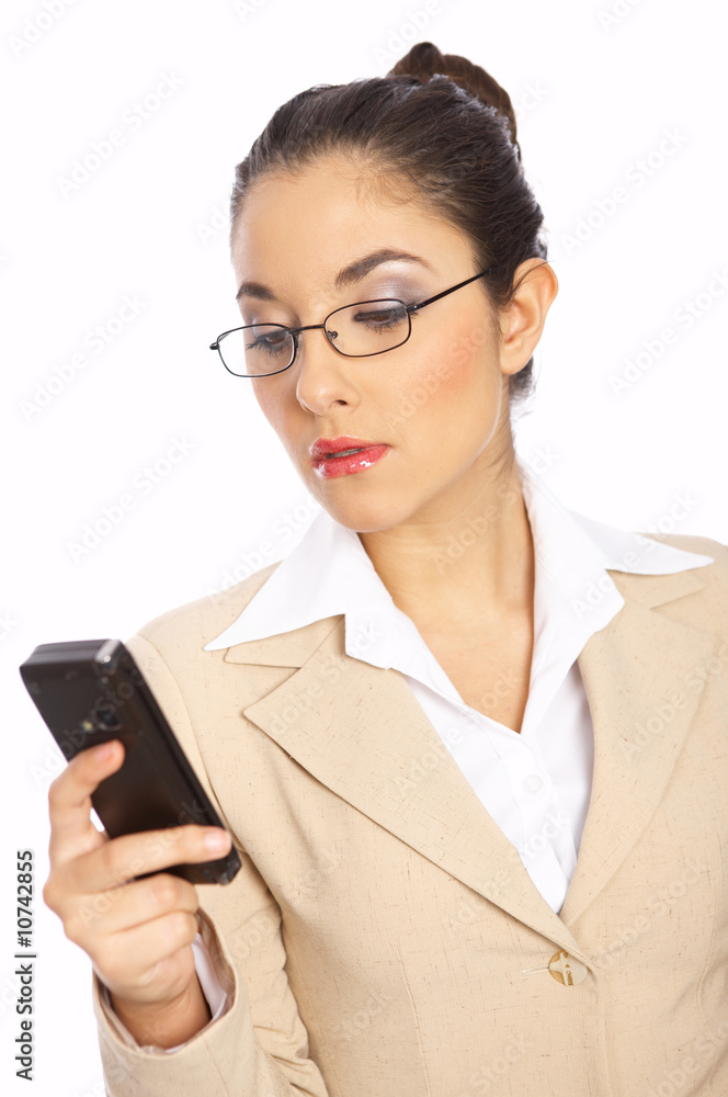 Business woman is writing text message on mobile phone Business woman is writing text message on mobile phone