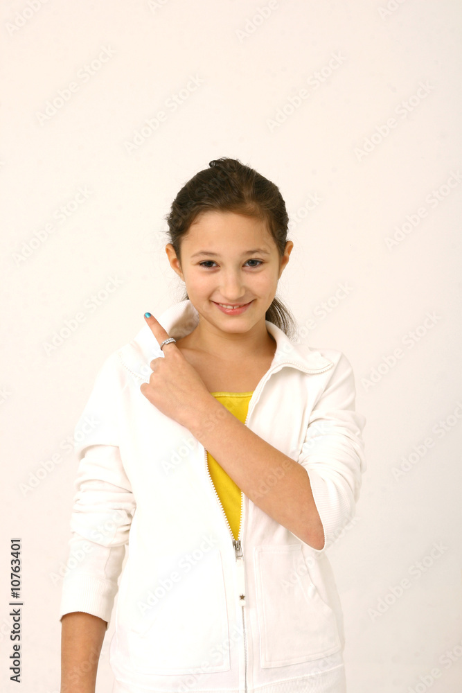 Smiling girl pointing