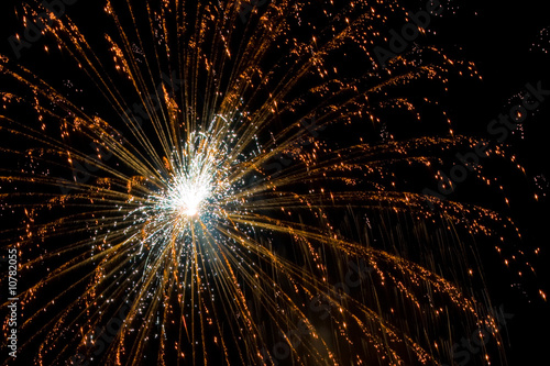 single-burst of fireworks with showering light streaks