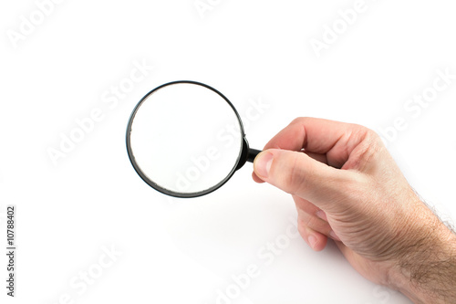 loupe or magnifier in hand inspect or examine