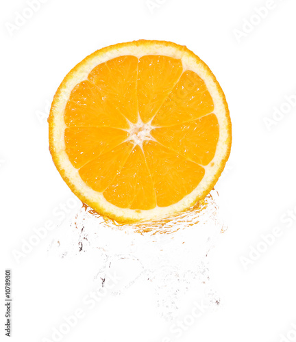 orange slice in splash