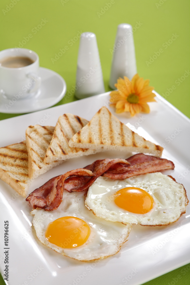 Breakfast - toasts, eggs, bacon Breakfast - toasts, eggs, bacon