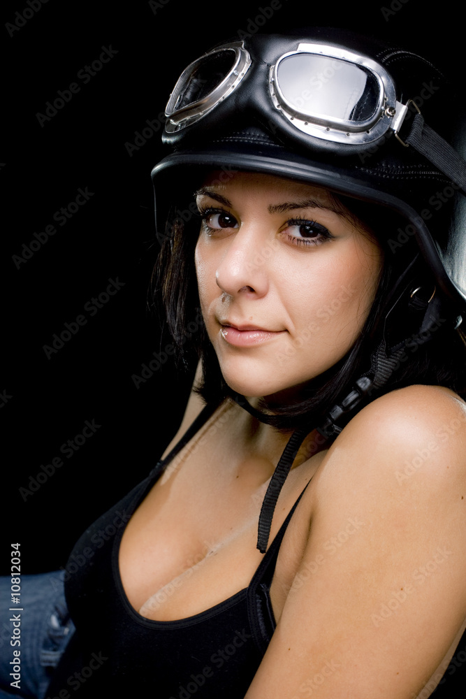 girl with US Army-style motorcycle helmet girl with US Army-style motorcycle helmet