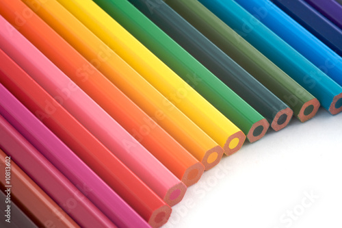 an arc of colour pencils
