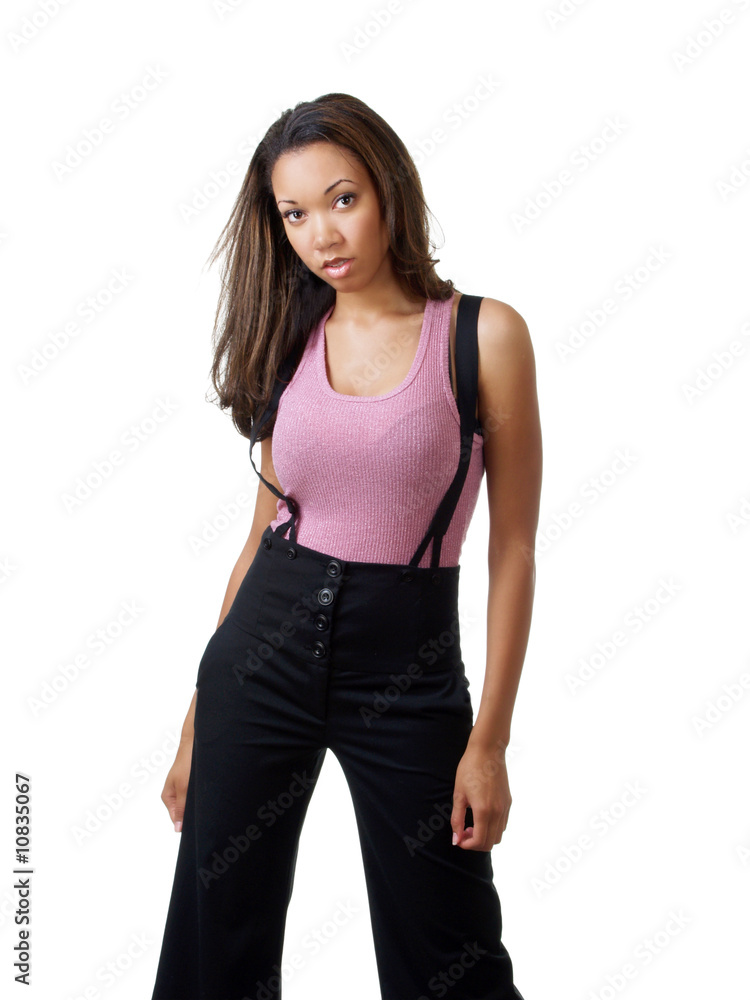 Young black woman in pants outfit pink top Young black woman in pants outfit pink top