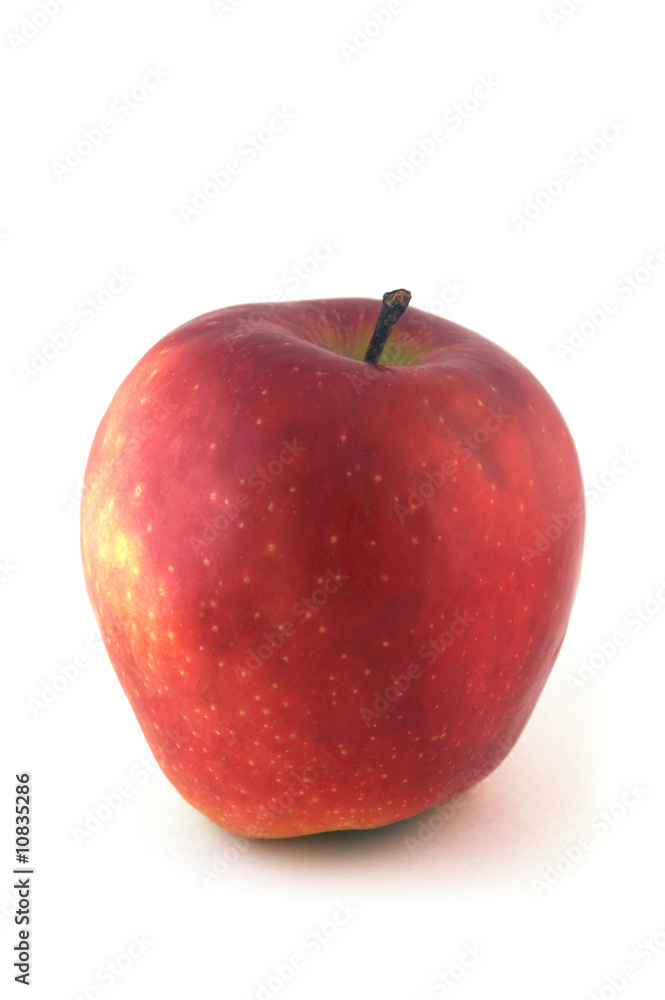 The ripe juicy red apple. Isolation on white. The ripe juicy red apple. Isolation on white.