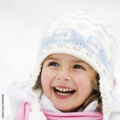 Happy girl on snow