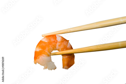 Shrimp in chopsticks.