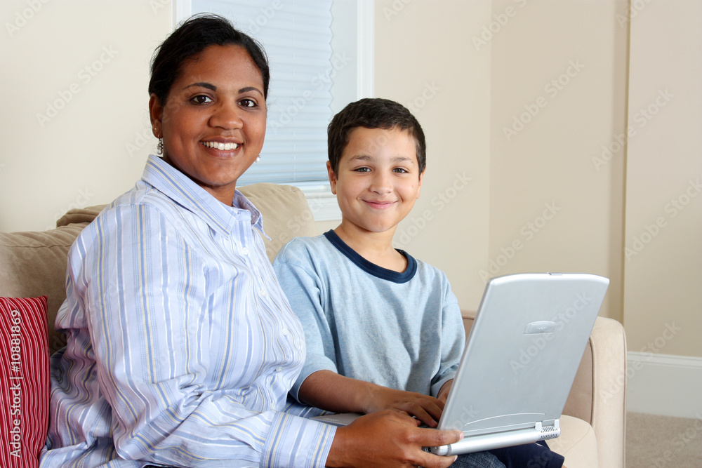 Woman and Boy On Computer