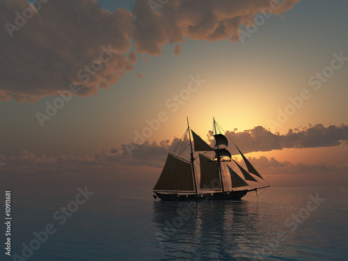 Sunset on Sea with Schooner