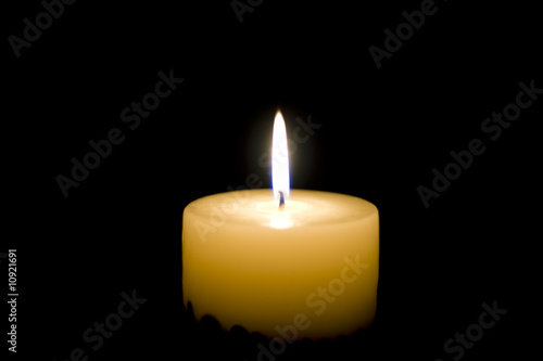 Close-up view of the candle in the night