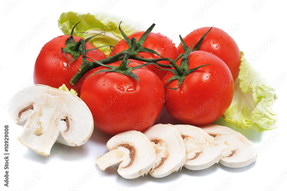 tomatos with mushroom lie on leaves
