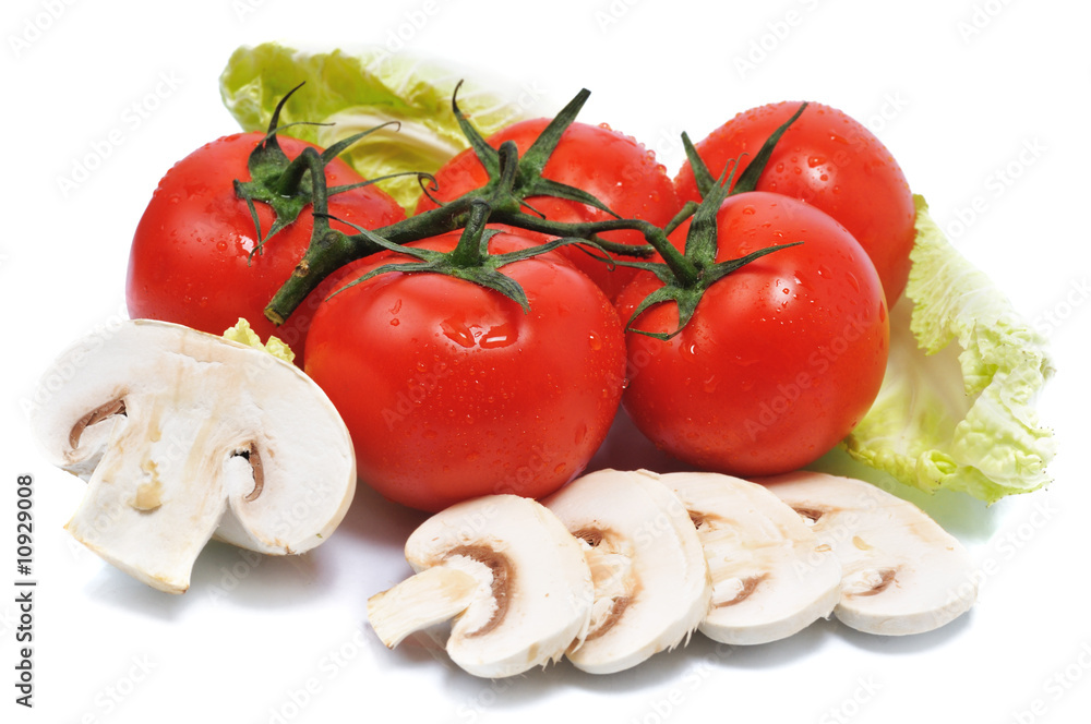 tomatos with mushroom lie on leaves tomatos with mushroom lie on leaves
