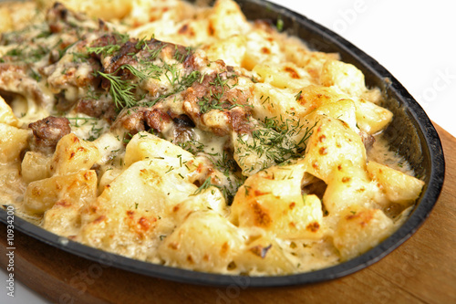 Beef home style - baked with a potato in cream.