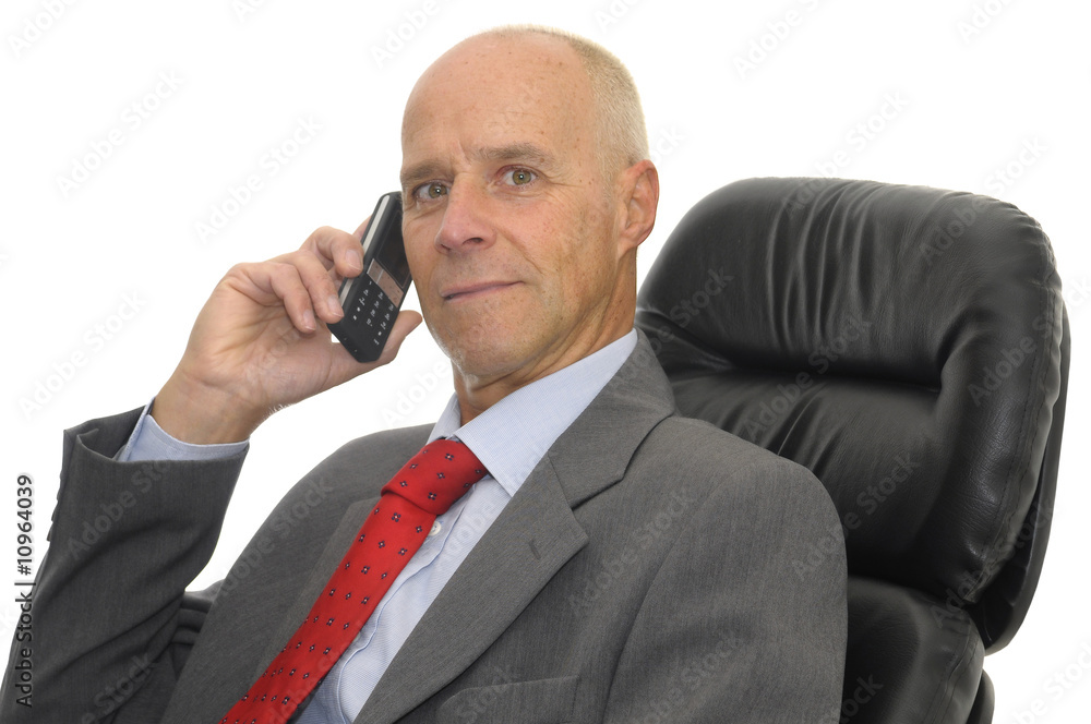 Mature man with cellphone isolated in white Mature man with cellphone isolated in white