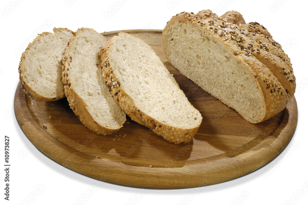 isolated bread with grains on a board
