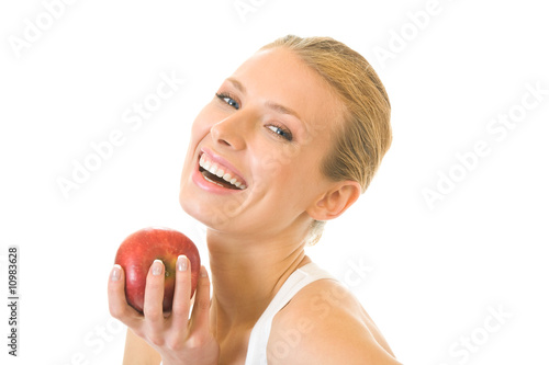 Young happy smiling woman with apple, isolated on white