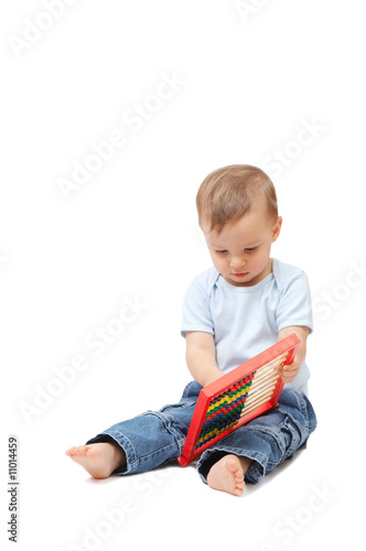 adorable baby playing with abacus