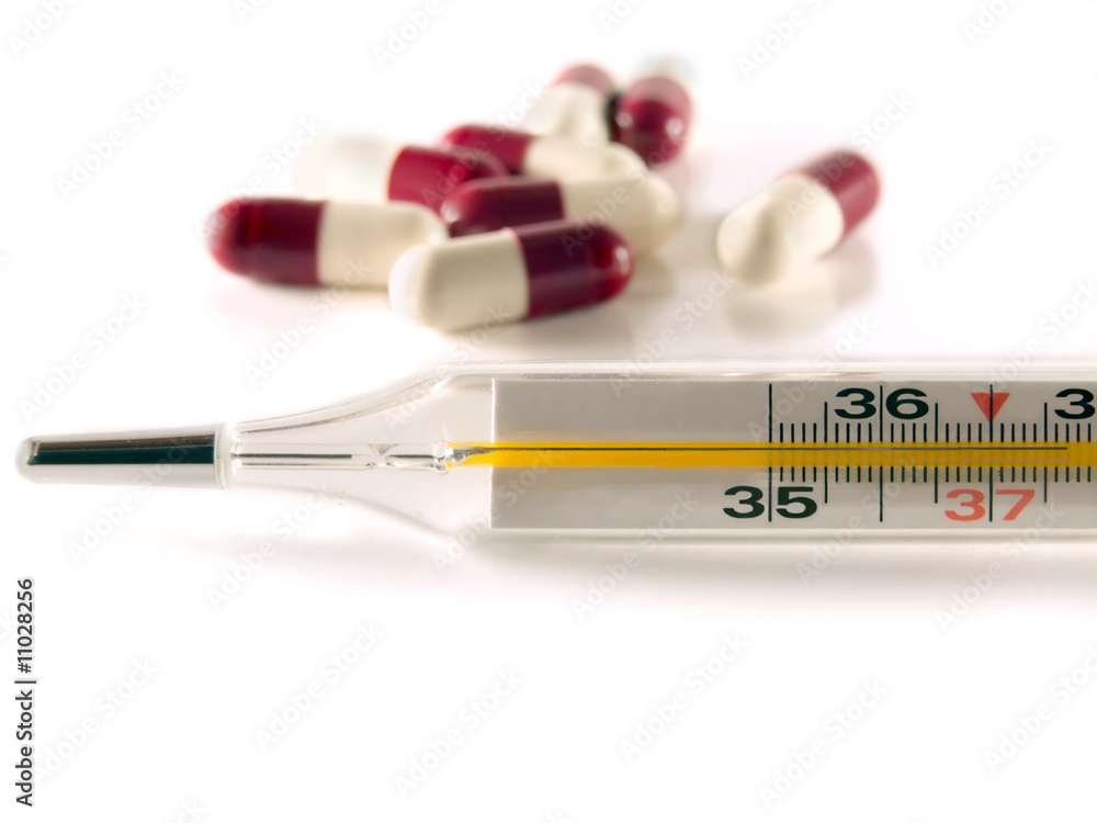 Thermometer and pills Thermometer and pills