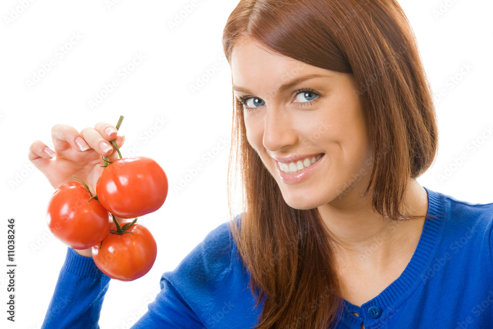 Young happy woman with tomatoes, isolated on white Young happy woman with tomatoes, isolated on white