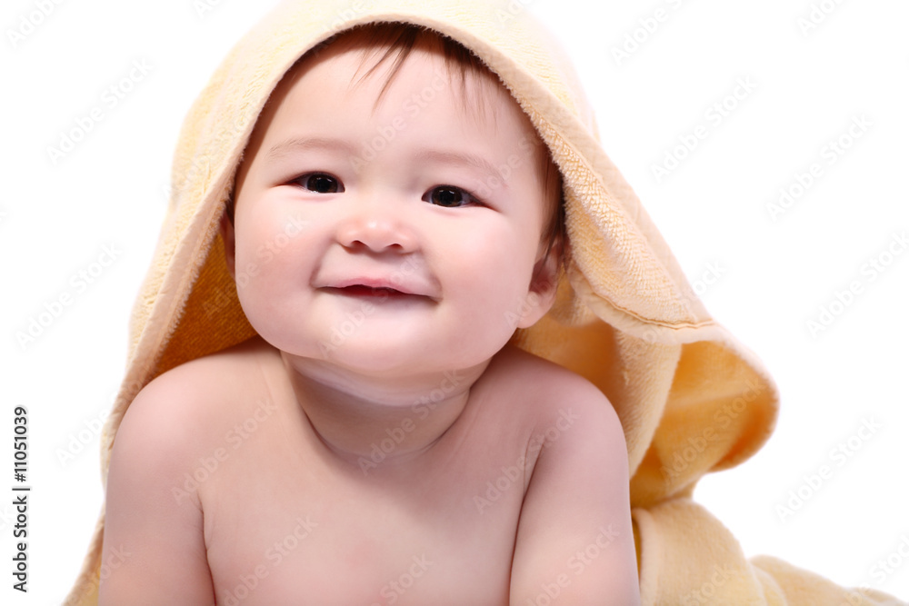 bright portrait of adorable smiling baby wrapped in towel bright portrait of adorable smiling baby wrapped in towel