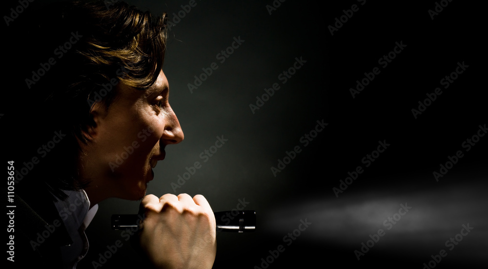 Fototapeta premium man with the flash-light
