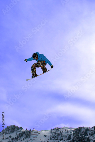 Snowboarder performing freestyle element