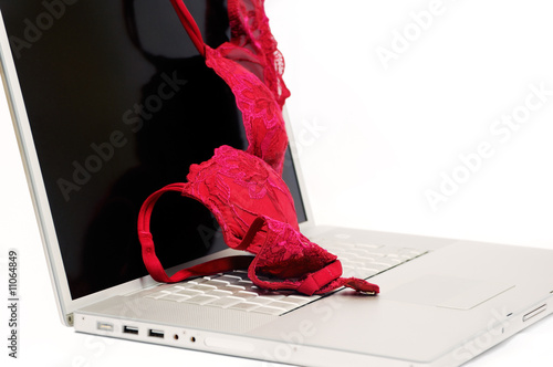 Red bra on laptop