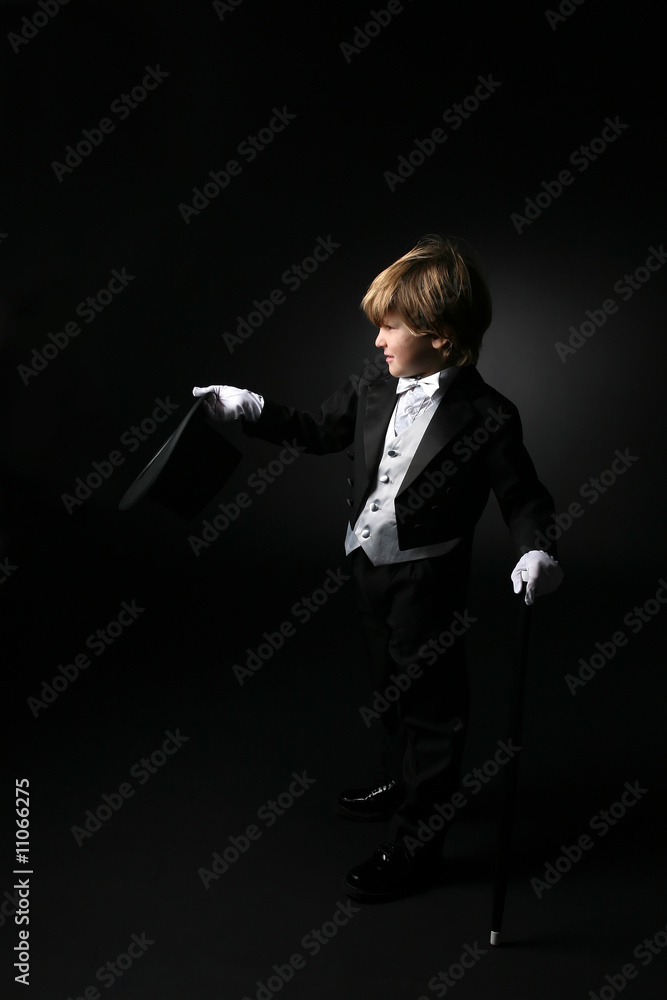 cute boy in black tuxedo and white gloves Stock Photo Adobe Stock