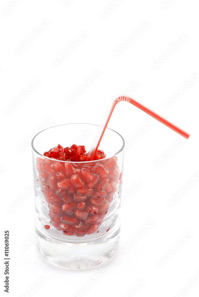 glass full of pomegranate seeds glass full of pomegranate seeds