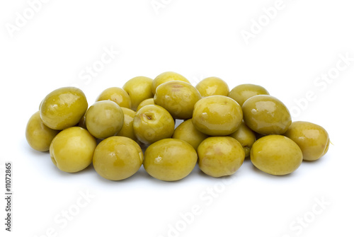 Some green olives with pits