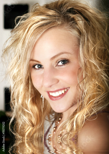 Curly blonde hair - pretty teen girl -