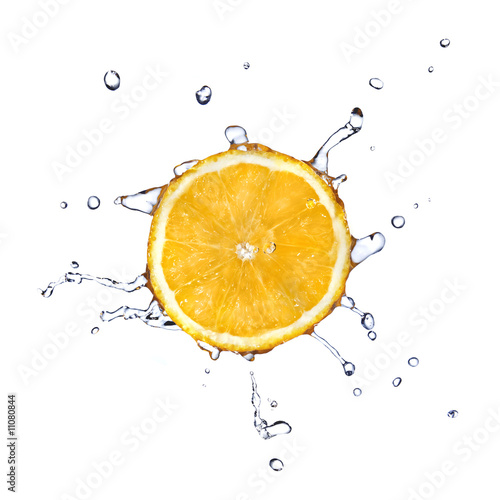 fresh water drops on orange isolated on white