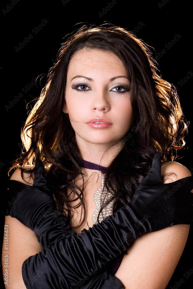 Portrait of the young woman over black Portrait of the young woman over black
