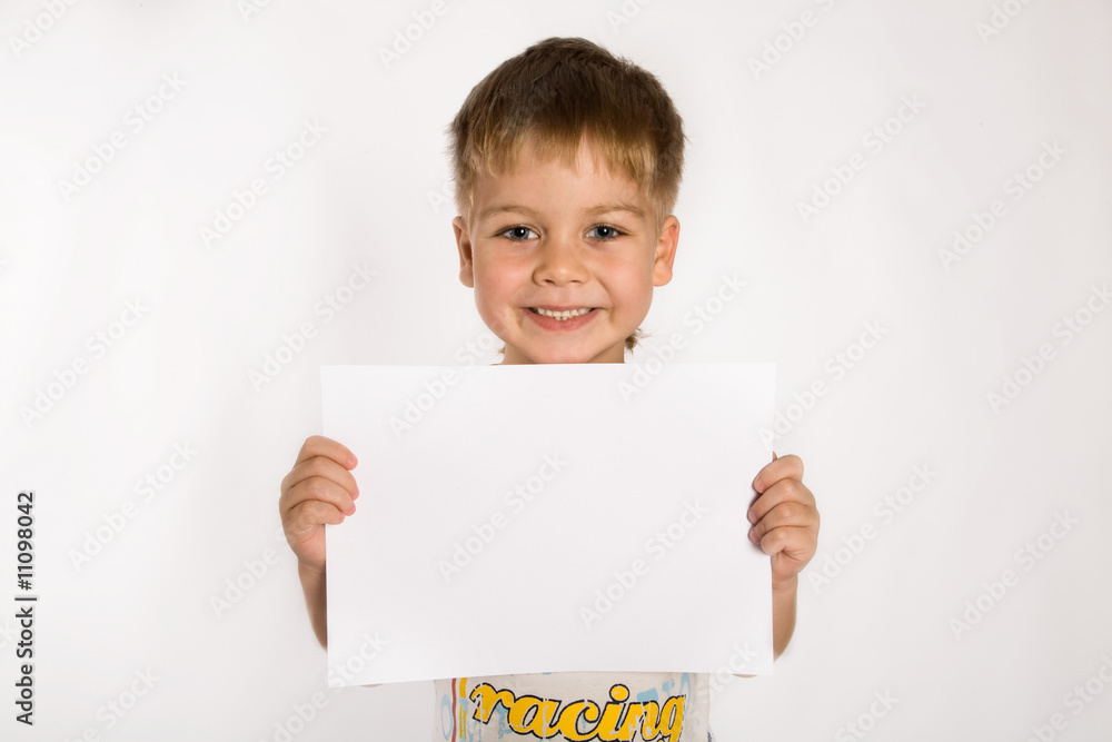 Young boy holding an empty advertising card Young boy holding an empty advertising card