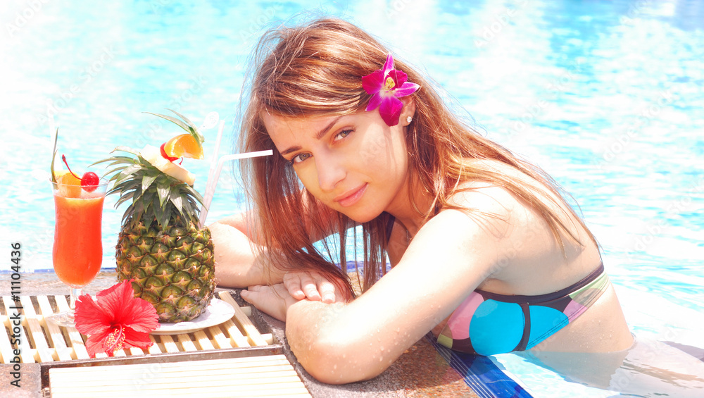 Girl in tropical pool Girl in tropical pool