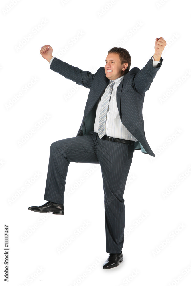 happy businessman with hands and leg up