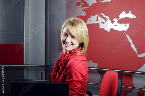 blond television reporter and presenter in front of the audiance photo