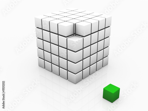 One individuality green cube on the white backround.