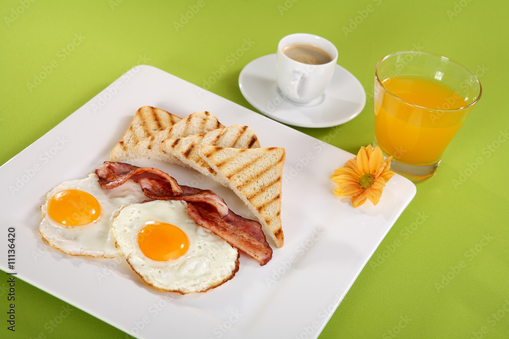 Fototapeta premium Breakfast - toasts, eggs, bacon