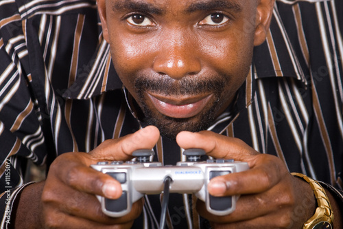 african man play video game