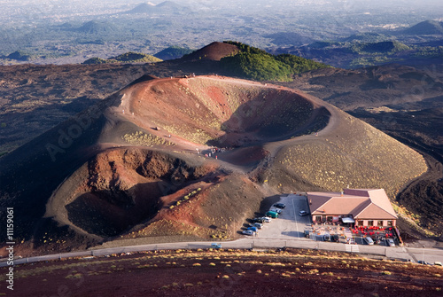 tourists on edge of volcanic Mount Etna photo