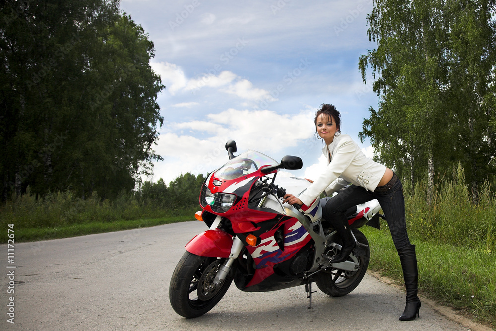 Obraz premium girl with motorbire