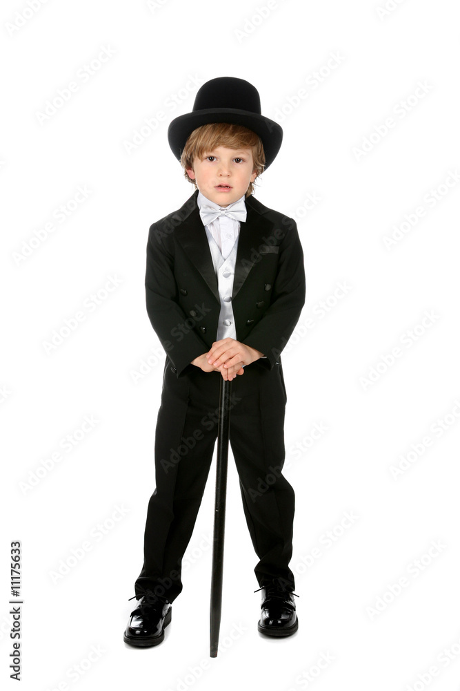 handsome young boy in black tuxedo and tophat
