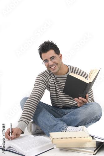 beautiful man studying at the university isolated in white
