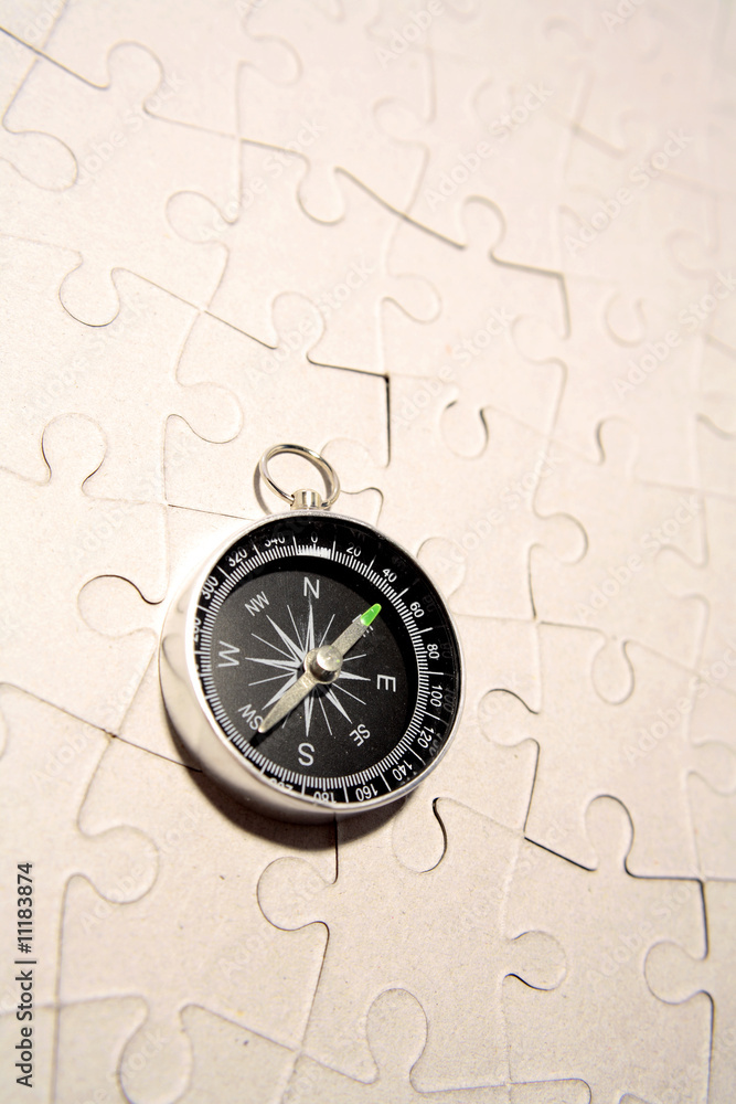 Compass on puzzle