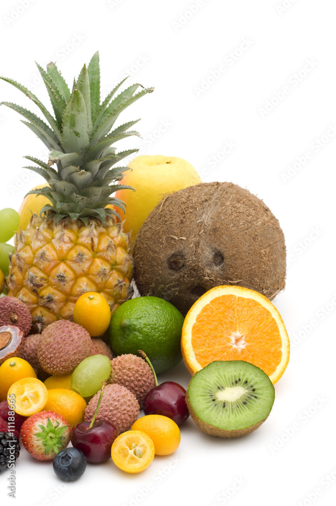exotic fruits and berries on white background exotic fruits and berries on white background