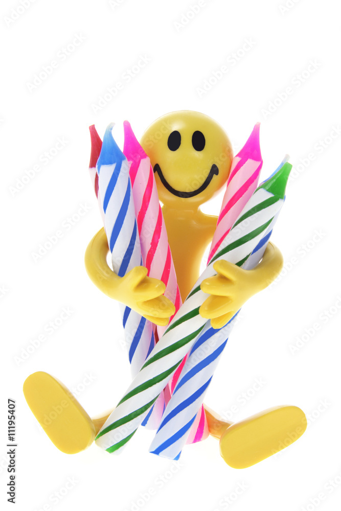 Rubber Figure Holding Birthday Candles Rubber Figure Holding Birthday Candles