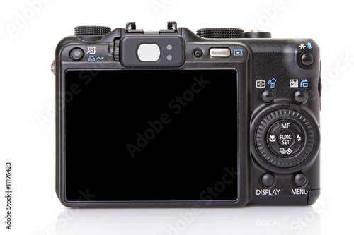 back of black digital compact camera isolated on white