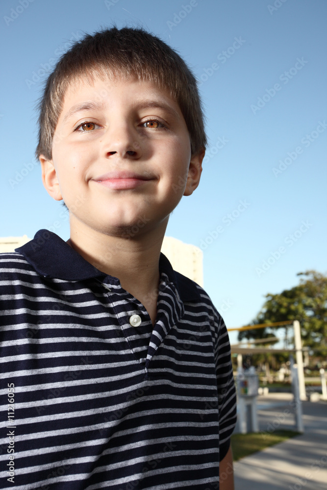 Young child on a blue sky